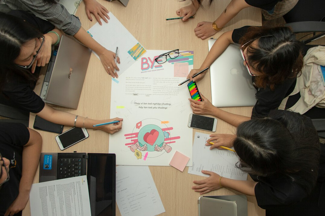 team brainstorming with tech